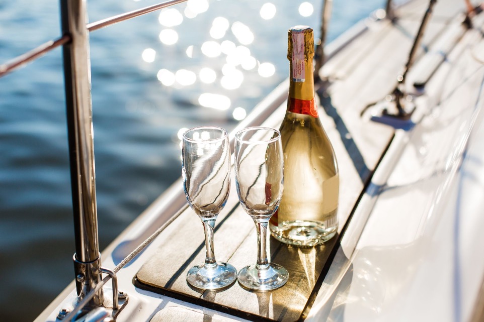 picture of a bottle of champagne on a luxury yacht