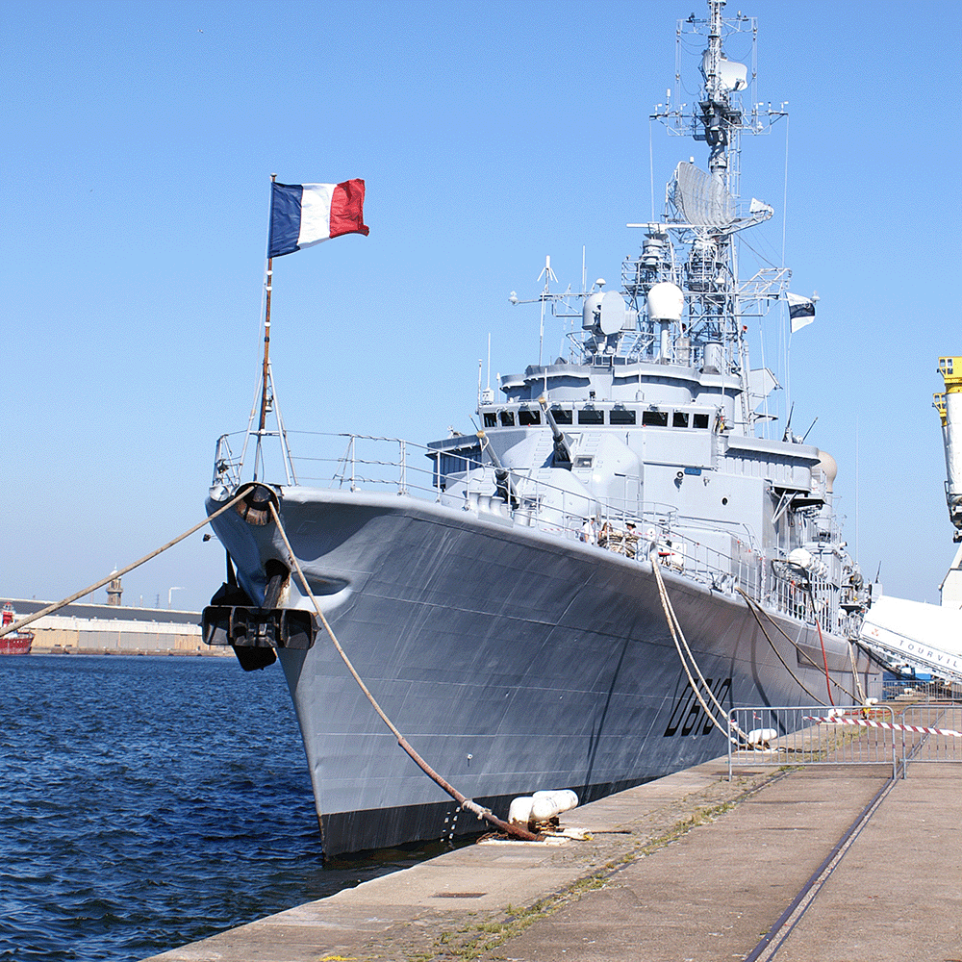 picture of a navy vessel at the dock