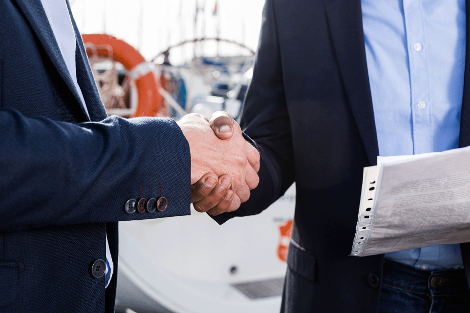 picture of two persons shaking their hands